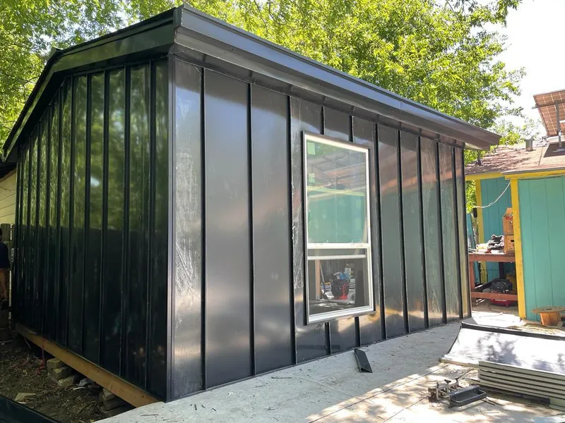 Black standing seam metal wall panels for Metal Roof Installation in Willmar