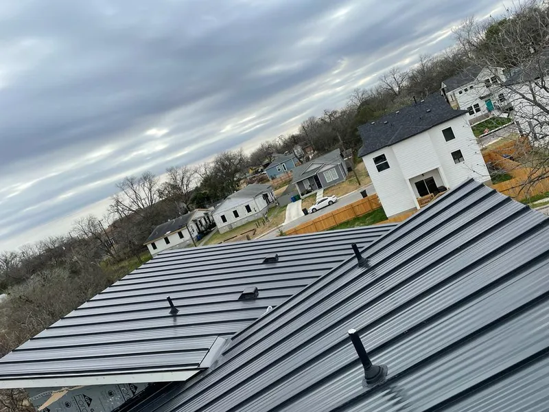 Standing seam metal roof panels with vents for Skylight Repair in Willmar